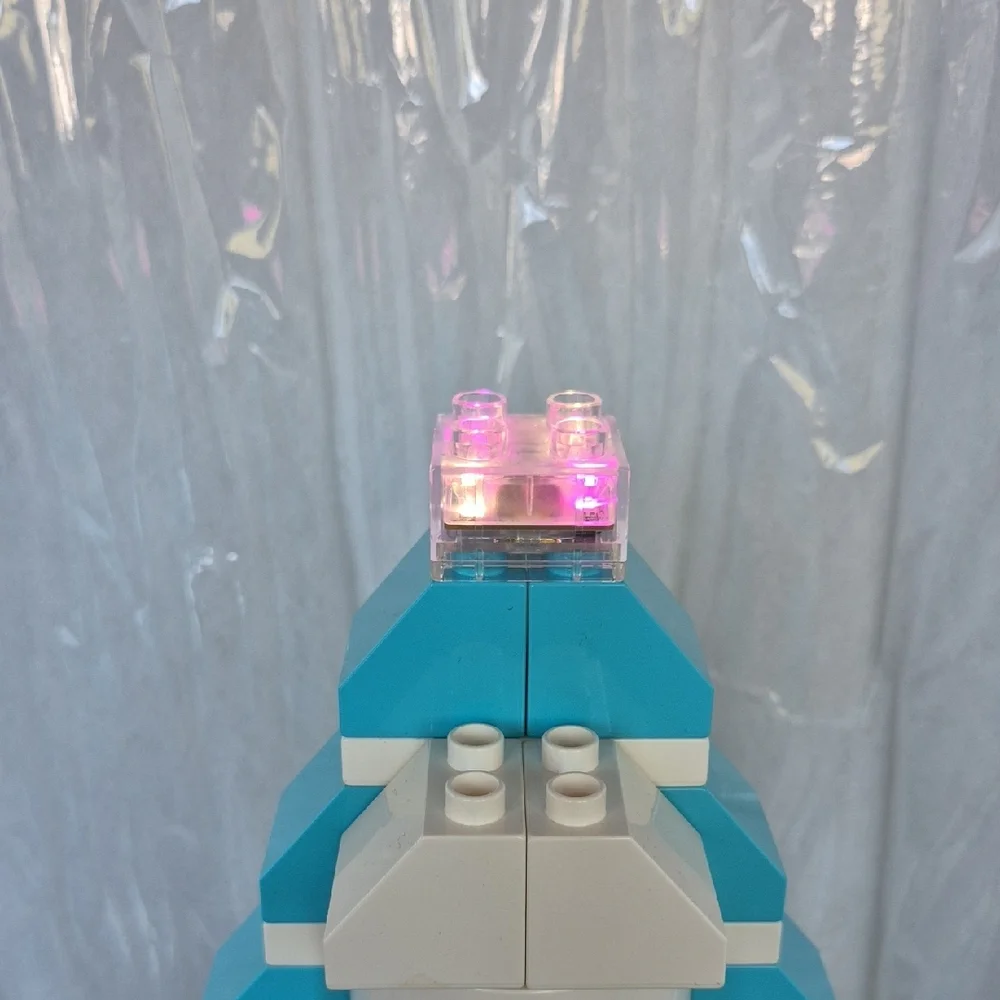 Dusney Frozen Castle Building Set with Light Brick Plus Doggie And Kids Playing.